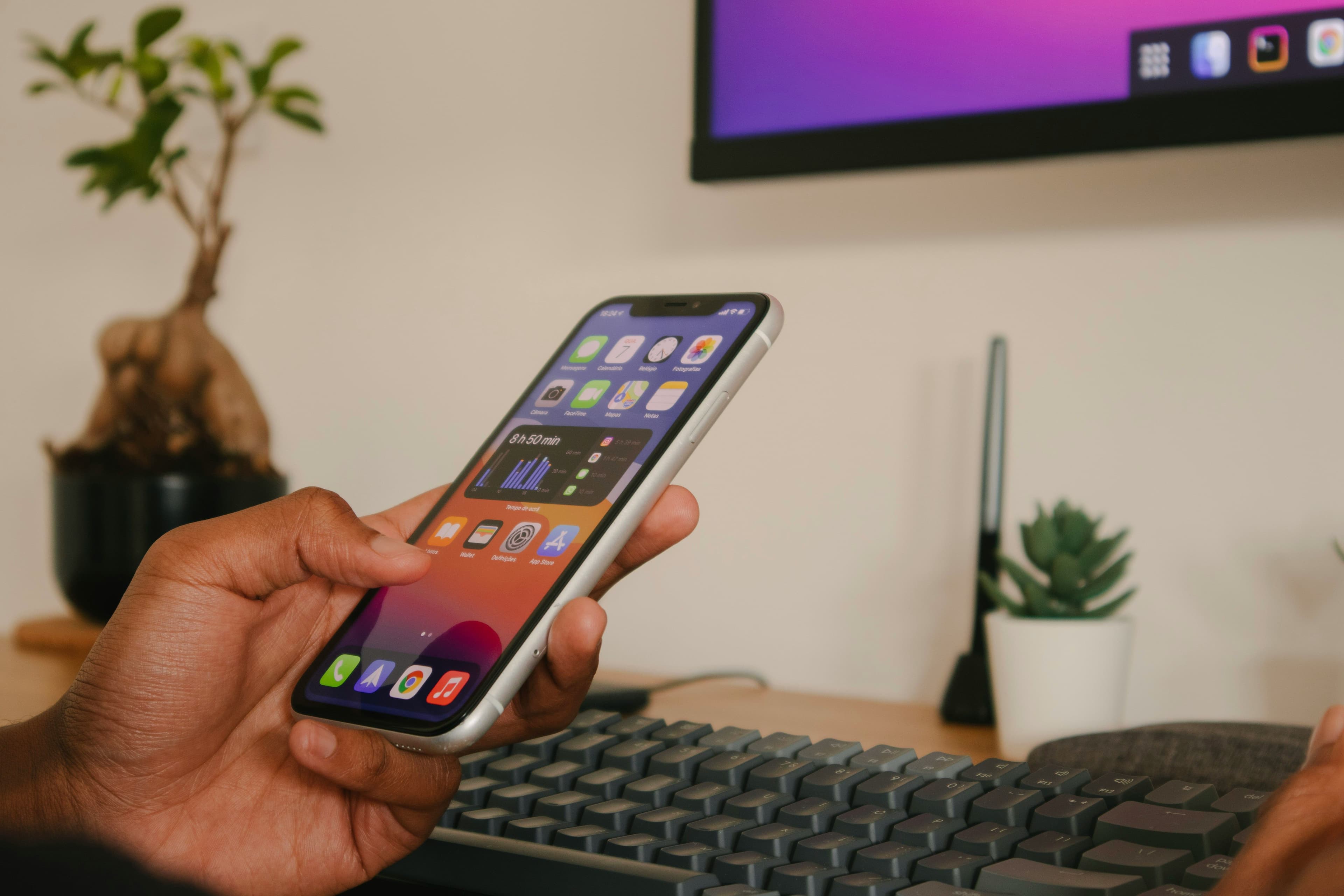 Someone using phone with social media apps